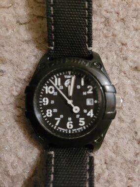 Timex unisex watch with Indiglo in great condition with black fabric band